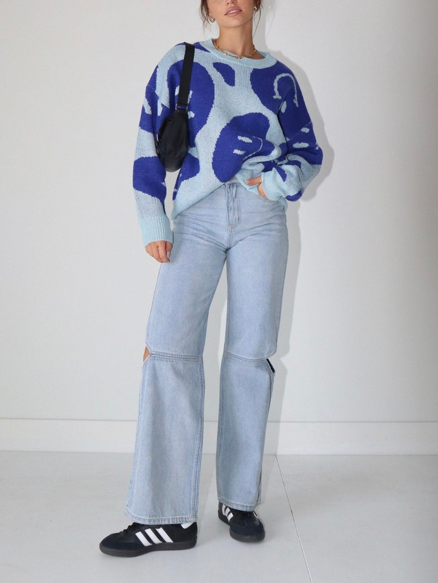 Cut out knee jeans